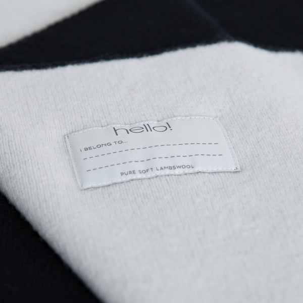 tullibee knitted blanket WOW black hello label close up