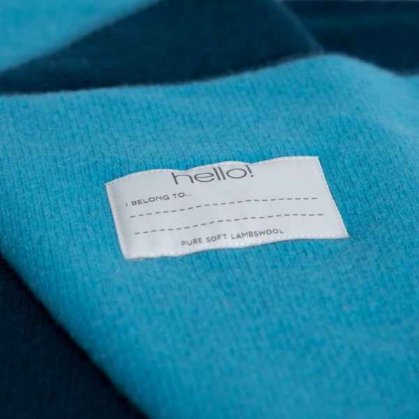 tullibee knitted blanket WOW blue hello label close up