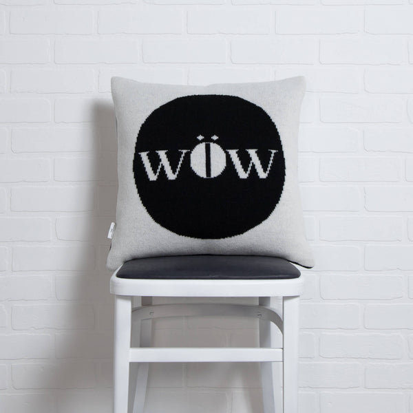 tullibee knitted cushion WOW black on chair