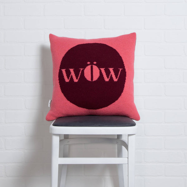 tullibee knitted cushion WOW pink on chair