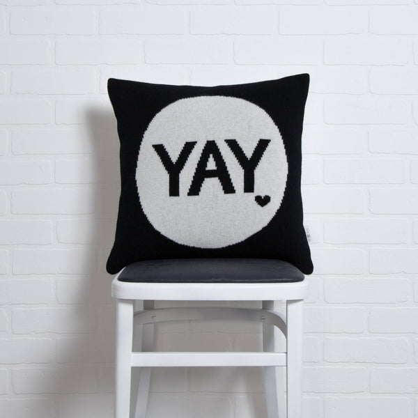tullibee knitted cushion YAY black on chair