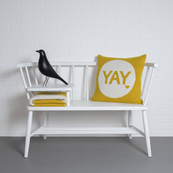 tullibee knitted cushion YAY mustard ercol bench with eames house bird