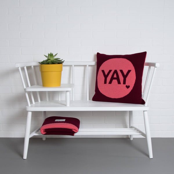 tullibee knitted cushion YAY pink ercol bench