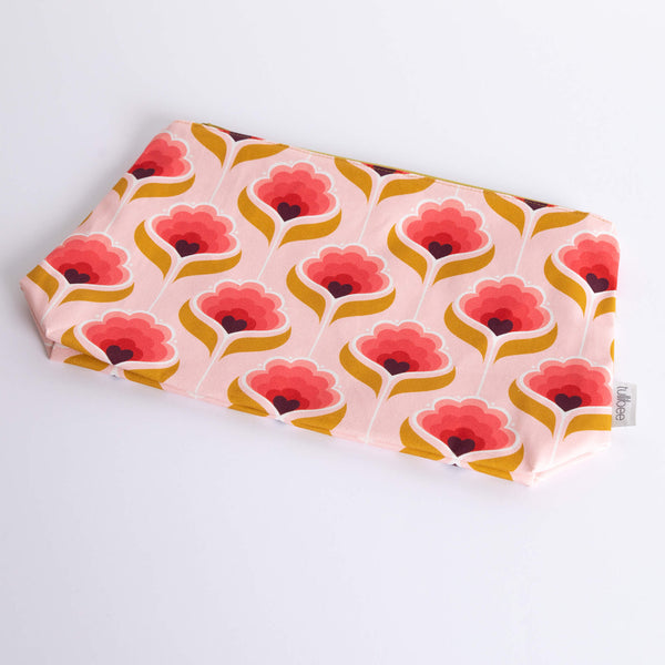 tullibee mini margot retro floral maxi pouch flat at an angle on a white surface