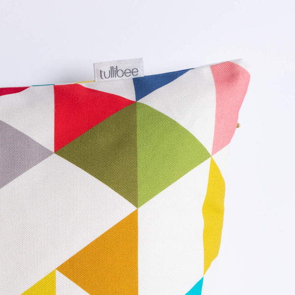 close up of tullibee brand label on side of Yoshi rainbow triangle cushion